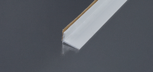 Profil ukončovací kútový samolepiaci AL elox šampanský matný 20x15mm 0